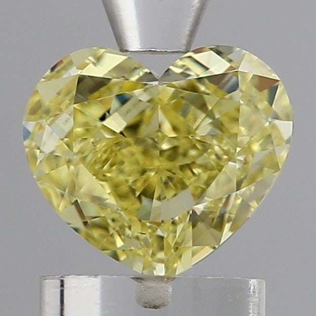 Loose Diamond - HEART 1.28ct Fancy Yellow VS1: Loose Diamond - HEART 1.28ct Fancy Yellow VS1 Source: This is a real non-mined Diamond that has been grown in a lab Shape: HEART Carats: 1.28 Color: Fancy Yellow Certification: IGI Video: