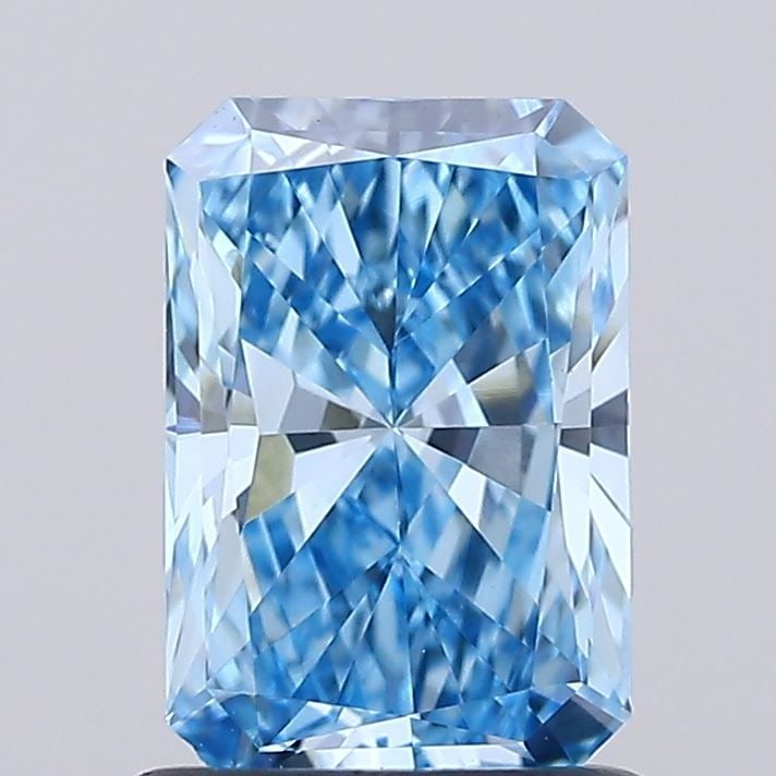 Loose Diamond - RADIANT 0.94ct Fancy Vivid Blue VVS2: Loose Diamond - RADIANT 0.94ct Fancy Vivid Blue VVS2 Source: This is a real non-mined Diamond that has been grown in a lab Shape: RADIANT Carats: 0.94 Color: Fancy Vivid Blue Certification: IGI Video: