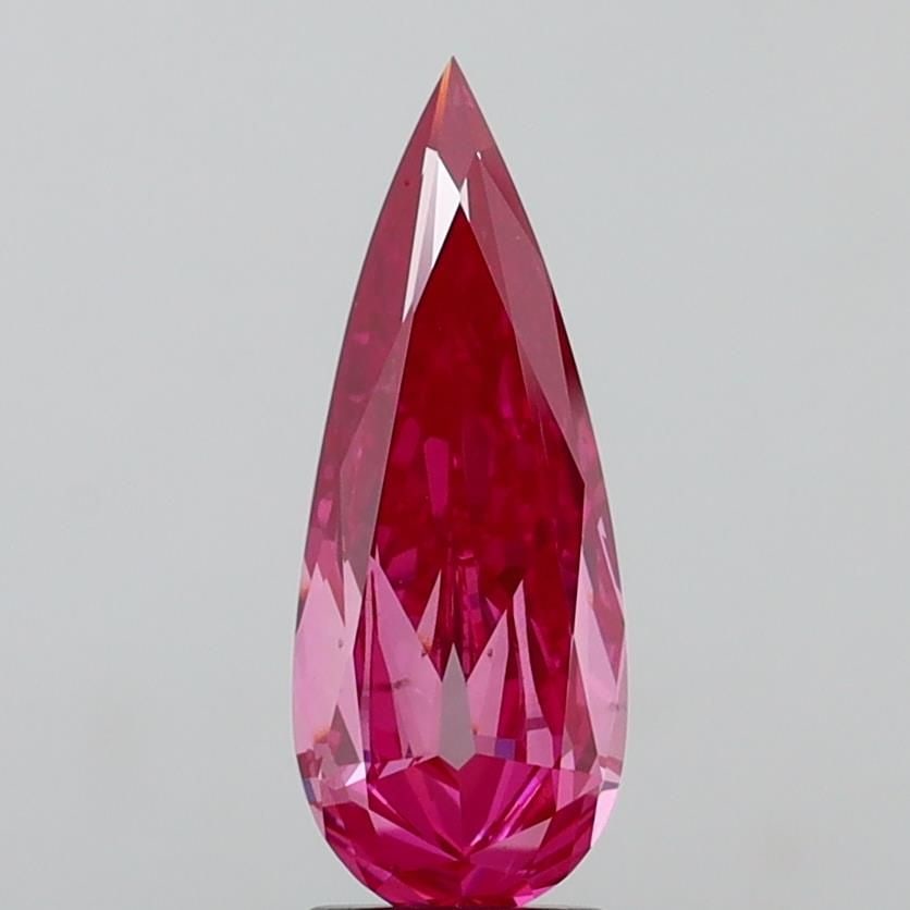 Loose Diamond - PEAR 2.16ct Fancy Vivid Pink VS2: Loose Diamond - PEAR 2.16ct Fancy Vivid Pink VS2 Source: This is a real non-mined Diamond that has been grown in a lab Shape: PEAR Carats: 2.16 Color: Fancy Vivid Pink Certification: IGI Video: