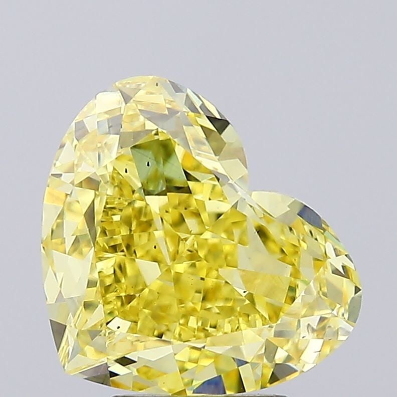 Loose Diamond - HEART 5.02ct Fancy Intense Yellow VS2: Loose Diamond - HEART 5.02ct Fancy Intense Yellow VS2 Source: This is a real non-mined Diamond that has been grown in a lab Shape: HEART Carats: 5.02 Color: Fancy Intense Yellow Certification: IGI Vid