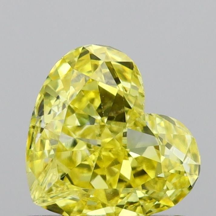 Loose Diamond - HEART 1.0ct Fancy Vivid Yellow VS2: Loose Diamond - HEART 1.0ct Fancy Vivid Yellow VS2 Source: This is a real non-mined Diamond that has been grown in a lab Shape: HEART Carats: 1.0 Color: Fancy Vivid Yellow Certification: IGI Video: