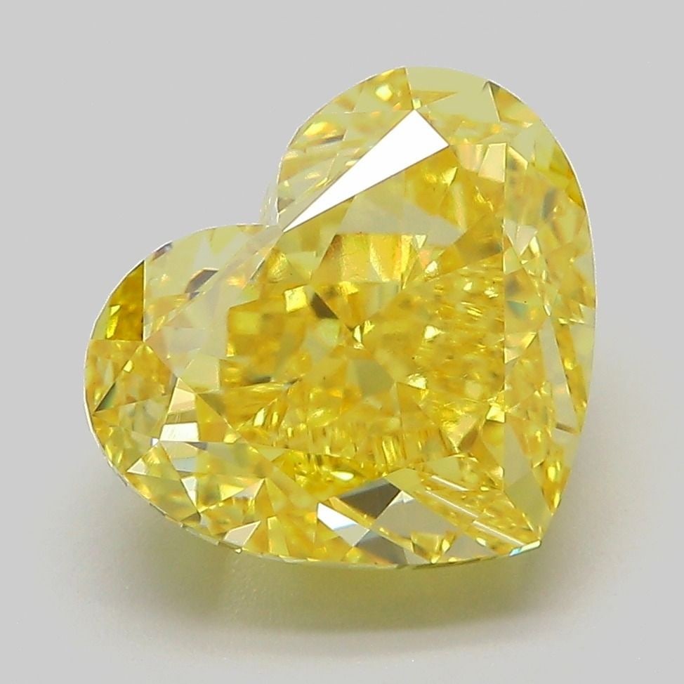 Loose Diamond - HEART 5.59ct Fancy Vivid Yellow VS1: Loose Diamond - HEART 5.59ct Fancy Vivid Yellow VS1 Source: This is a real non-mined Diamond that has been grown in a lab Shape: HEART Carats: 5.59 Color: Fancy Vivid Yellow Certification: IGI Video:
