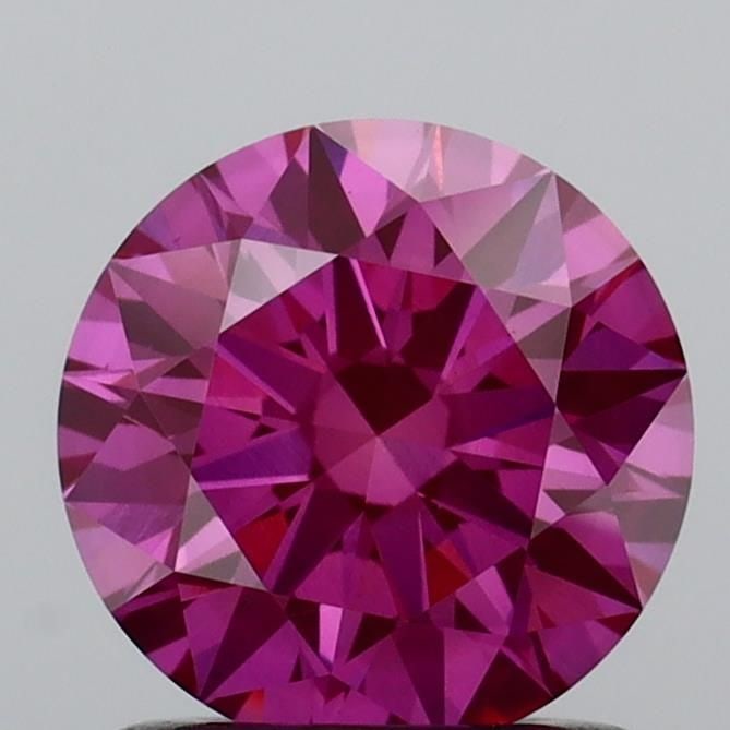 Ideal Loose Diamond - ROUND 1.1ct Fancy Vivid Pink VVS2: Ideal Loose Diamond - ROUND 1.1ct Fancy Vivid Pink VVS2 Source: This is a real non-mined Diamond that has been grown in a lab Shape: ROUND Carats: 1.1 Color: Fancy Vivid Pink Certification: IGI
