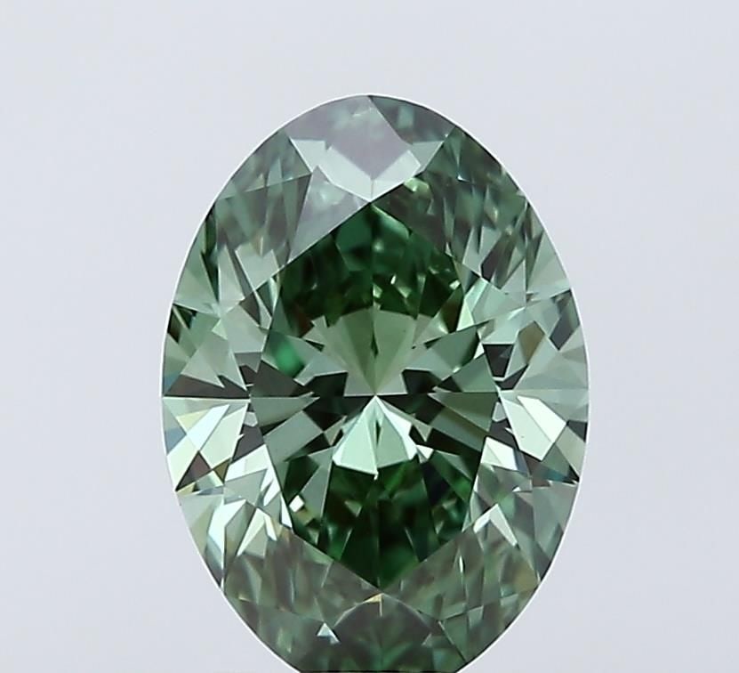 Loose Diamond - OVAL 2.07ct Fancy Vivid Green VVS2: Loose Diamond - OVAL 2.07ct Fancy Vivid Green VVS2 Source: This is a real non-mined Diamond that has been grown in a lab Shape: OVAL Carats: 2.07 Color: Fancy Vivid Green Certification: IGI Video: