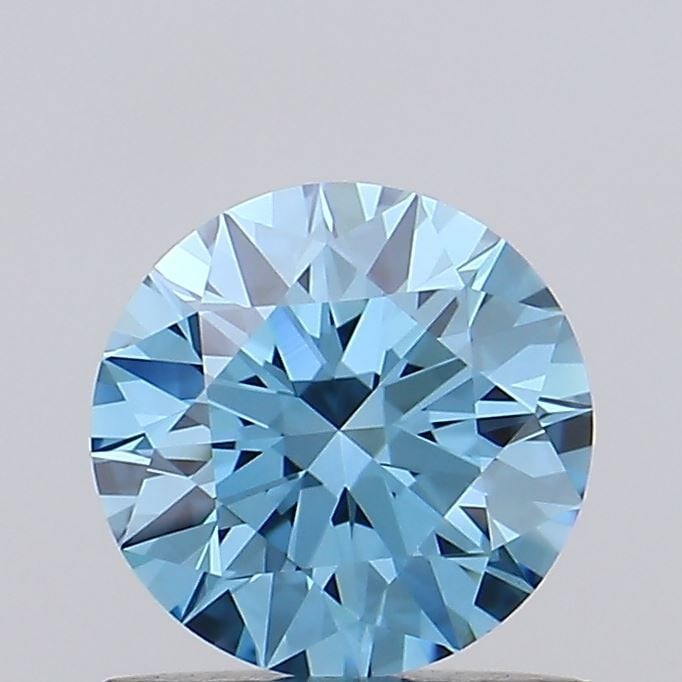 Ideal Loose Diamond - ROUND 0.83ct Fancy Vivid Blue VVS1: Ideal Loose Diamond - ROUND 0.83ct Fancy Vivid Blue VVS1 Source: This is a real non-mined Diamond that has been grown in a lab Shape: ROUND Carats: 0.83 Color: Fancy Vivid Blue Certification: IGI Vide