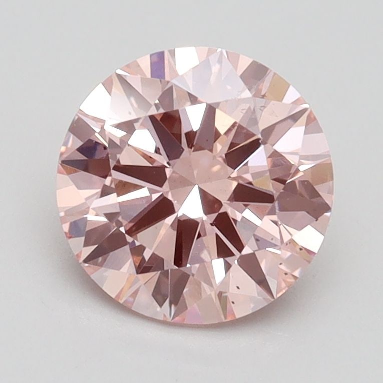 Loose Diamond - ROUND 1.52ct Fancy Intense Pink SI1: Loose Diamond - ROUND 1.52ct Fancy Intense Pink SI1 Source: This is a real non-mined Diamond that has been grown in a lab Shape: ROUND Carats: 1.52 Color: Fancy Intense Pink Certification: IGI Video: