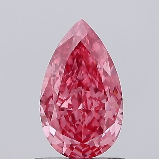 Loose Diamond - PEAR 0.93ct Fancy Vivid Pink VS1: Loose Diamond - PEAR 0.93ct Fancy Vivid Pink VS1 Source: This is a real non-mined Diamond that has been grown in a lab Shape: PEAR Carats: 0.93 Color: Fancy Vivid Pink Certification: IGI Video: