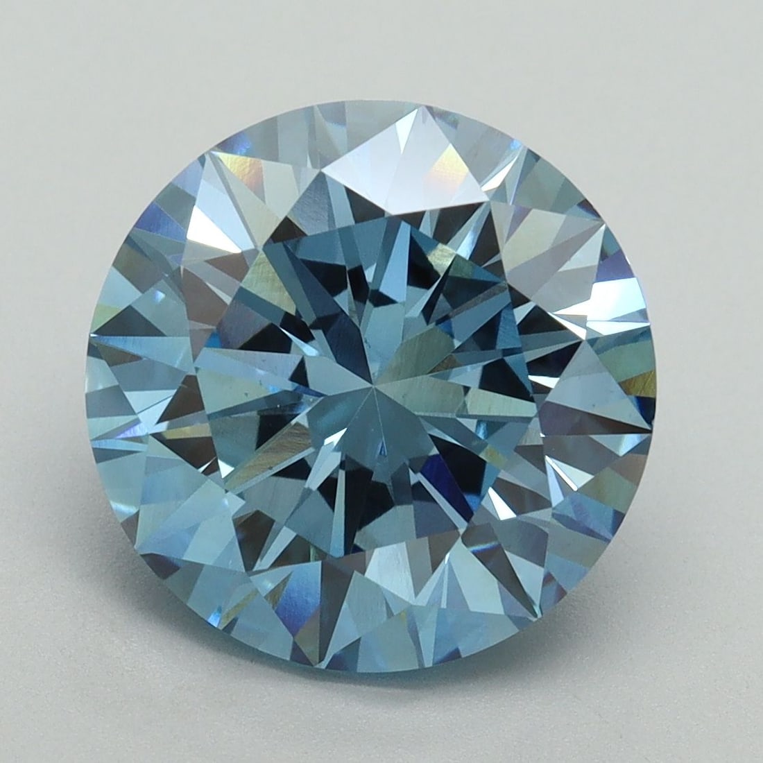 Loose Diamond - ROUND 5.22ct Fancy Vivid Blue VS1: Loose Diamond - ROUND 5.22ct Fancy Vivid Blue VS1 Source: This is a real non-mined Diamond that has been grown in a lab Shape: ROUND Carats: 5.22 Color: Fancy Vivid Blue Certification: IGI Video: