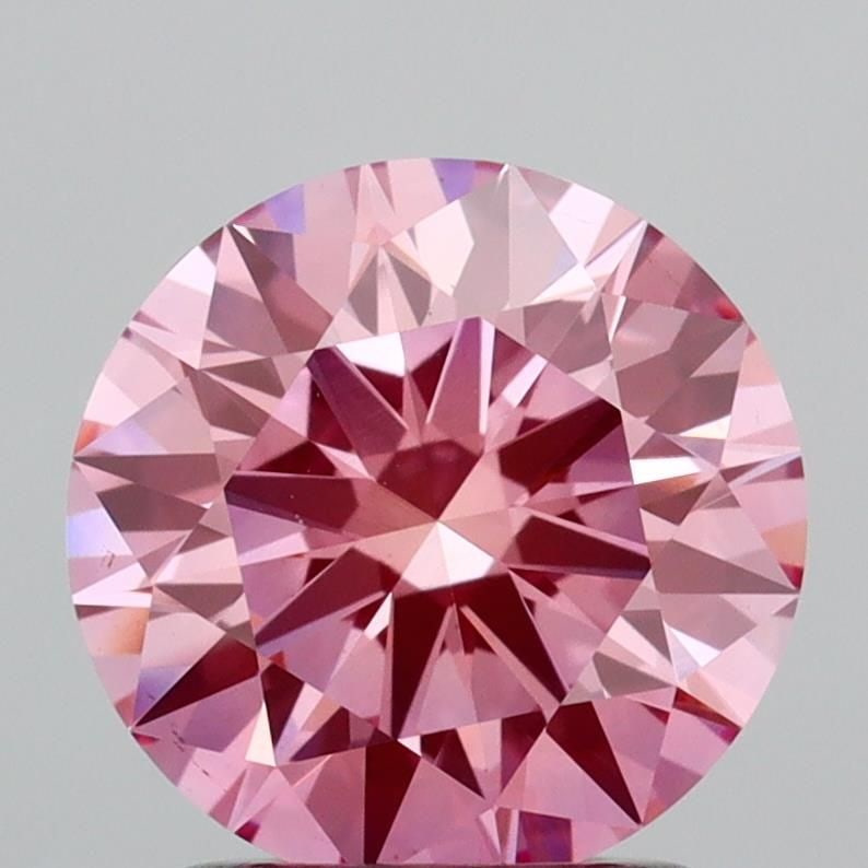 Ideal Loose Diamond - ROUND 1.59ct Fancy Vivid Pink VVS2: Ideal Loose Diamond - ROUND 1.59ct Fancy Vivid Pink VVS2 Source: This is a real non-mined Diamond that has been grown in a lab Shape: ROUND Carats: 1.59 Color: Fancy Vivid Pink Certification: IGI Vide