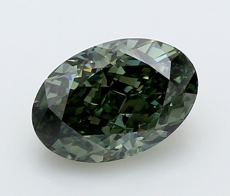 Loose Diamond - OVAL 3.14ct Fancy Vivid Green VVS2: Loose Diamond - OVAL 3.14ct Fancy Vivid Green VVS2 Source: This is a real non-mined Diamond that has been grown in a lab Shape: OVAL Carats: 3.14 Color: Fancy Vivid Green Certification: IGI Video: