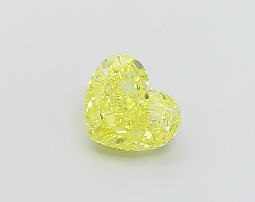 Loose Diamond - HEART 1.05ct Fancy Vivid Yellow VVS2: Loose Diamond - HEART 1.05ct Fancy Vivid Yellow VVS2 Source: This is a real non-mined Diamond that has been grown in a lab Shape: HEART Carats: 1.05 Color: Fancy Vivid Yellow Certification: IGI Video: