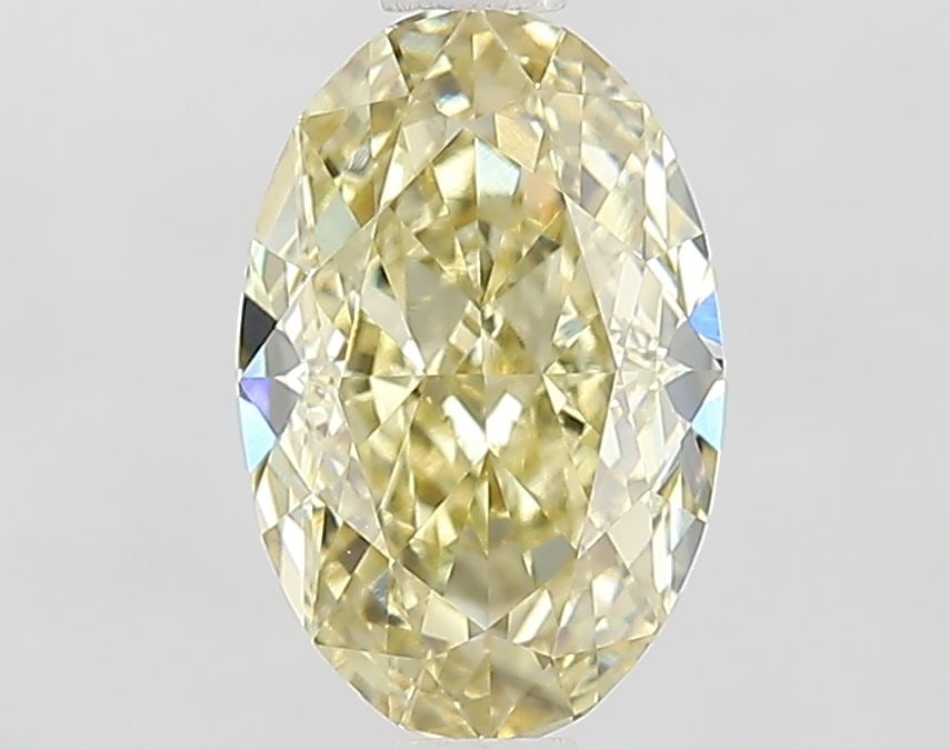Loose Diamond - OVAL 1.59ct Fancy Intense Yellow VVS2: Loose Diamond - OVAL 1.59ct Fancy Intense Yellow VVS2 Source: This is a real non-mined Diamond that has been grown in a lab Shape: OVAL Carats: 1.59 Color: Fancy Intense Yellow Certification: IGI The 