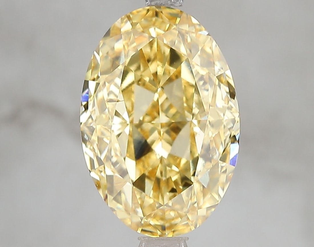 Loose Diamond - OVAL 5.04ct Fancy Vivid Yellow SI1: Loose Diamond - OVAL 5.04ct Fancy Vivid Yellow SI1 Source: This is a real non-mined Diamond that has been grown in a lab Shape: OVAL Carats: 5.04 Color: Fancy Vivid Yellow Certification: IGI Video: