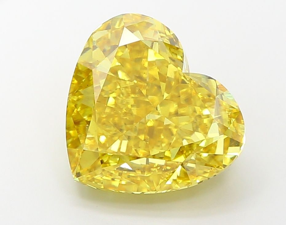 Loose Diamond - HEART 12.07ct Fancy Vivid Yellow VS2: Loose Diamond - HEART 12.07ct Fancy Vivid Yellow VS2 Source: This is a real non-mined Diamond that has been grown in a lab Shape: HEART Carats: 12.07 Color: Fancy Vivid Yellow Certification: IGI Video