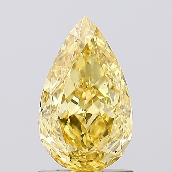 Loose Diamond - PEAR 1.22ct Fancy Vivid Yellow VS1: Loose Diamond - PEAR 1.22ct Fancy Vivid Yellow VS1 Source: This is a real non-mined Diamond that has been grown in a lab Shape: PEAR Carats: 1.22 Color: Fancy Vivid Yellow Certification: IGI Video: