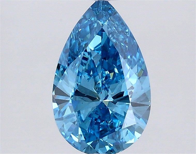 Loose Diamond - PEAR 0.99ct Fancy Vivid Blue VS2: Loose Diamond - PEAR 0.99ct Fancy Vivid Blue VS2 Source: This is a real non-mined Diamond that has been grown in a lab Shape: PEAR Carats: 0.99 Color: Fancy Vivid Blue Certification: IGI Video: