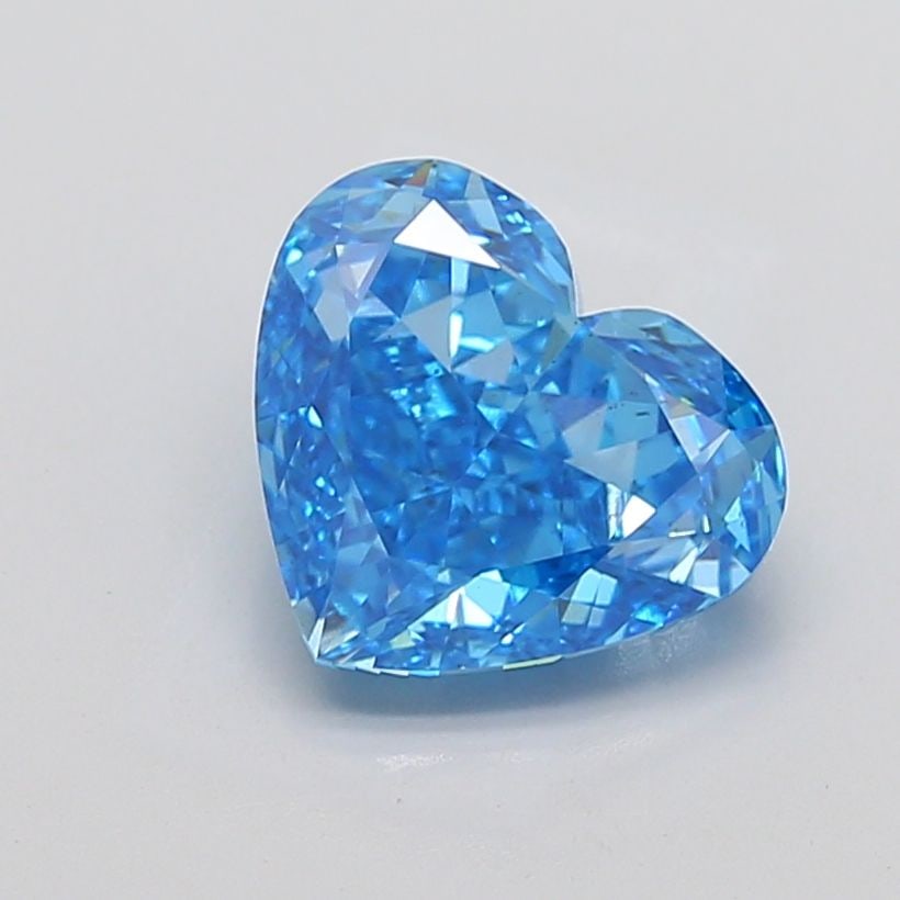Loose Diamond - HEART 4.68ct Fancy Vivid Blue VS2: Loose Diamond - HEART 4.68ct Fancy Vivid Blue VS2 Source: This is a real non-mined Diamond that has been grown in a lab Shape: HEART Carats: 4.68 Color: Fancy Vivid Blue Certification: IGI Video: