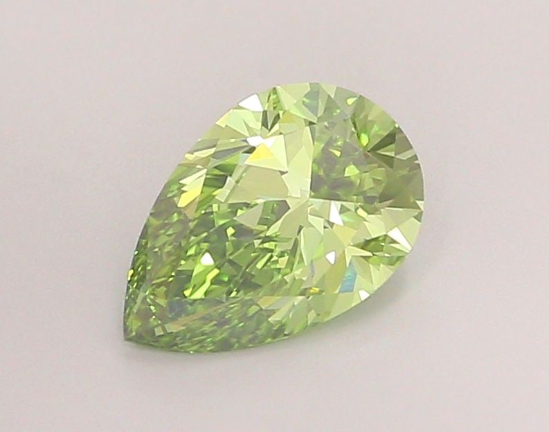 Loose Diamond - PEAR 1.44ct Fancy Vivid Green VVS2: Loose Diamond - PEAR 1.44ct Fancy Vivid Green VVS2 Source: This is a real non-mined Diamond that has been grown in a lab Shape: PEAR Carats: 1.44 Color: Fancy Vivid Green Certification: IGI Video: