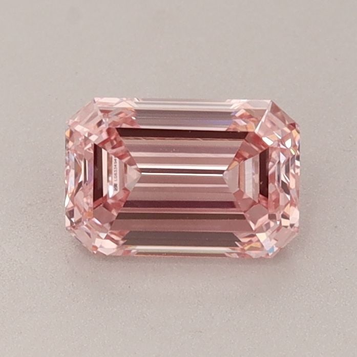 Loose Diamond - EMERALD 0.85ct Fancy Intense Pink VS2: Loose Diamond - EMERALD 0.85ct Fancy Intense Pink VS2 Source: This is a real non-mined Diamond that has been grown in a lab Shape: EMERALD Carats: 0.85 Color: Fancy Intense Pink Certification: IGI Vid