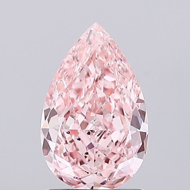 Loose Diamond - PEAR 1.21ct Fancy Vivid Pink VS2: Loose Diamond - PEAR 1.21ct Fancy Vivid Pink VS2 Source: This is a real non-mined Diamond that has been grown in a lab Shape: PEAR Carats: 1.21 Color: Fancy Vivid Pink Certification: IGI Video: