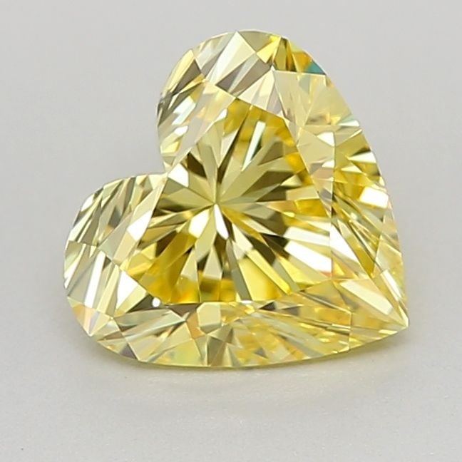 Loose Diamond - HEART 0.64ct Fancy Vivid Yellow VVS2: Loose Diamond - HEART 0.64ct Fancy Vivid Yellow VVS2 Source: This is a real non-mined Diamond that has been grown in a lab Shape: HEART Carats: 0.64 Color: Fancy Vivid Yellow Certification: IGI Video: