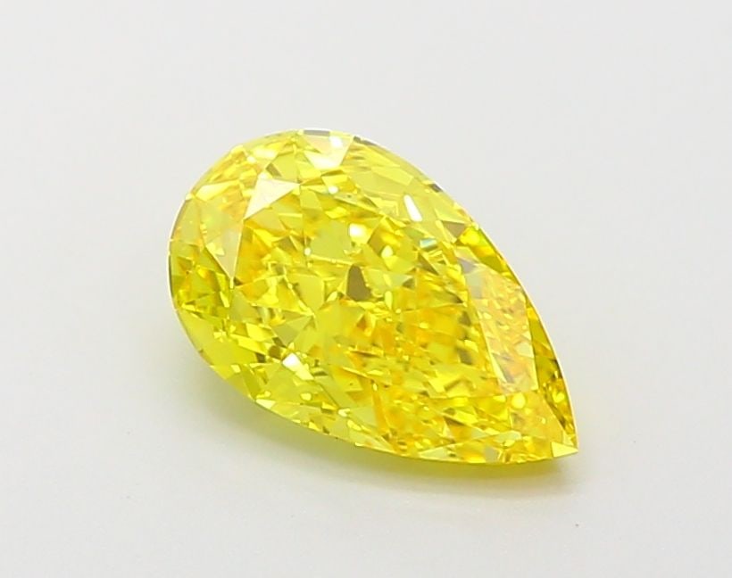 Loose Diamond - PEAR 1.56ct Fancy Vivid Yellow VVS2: Loose Diamond - PEAR 1.56ct Fancy Vivid Yellow VVS2 Source: This is a real non-mined Diamond that has been grown in a lab Shape: PEAR Carats: 1.56 Color: Fancy Vivid Yellow Certification: IGI Video: