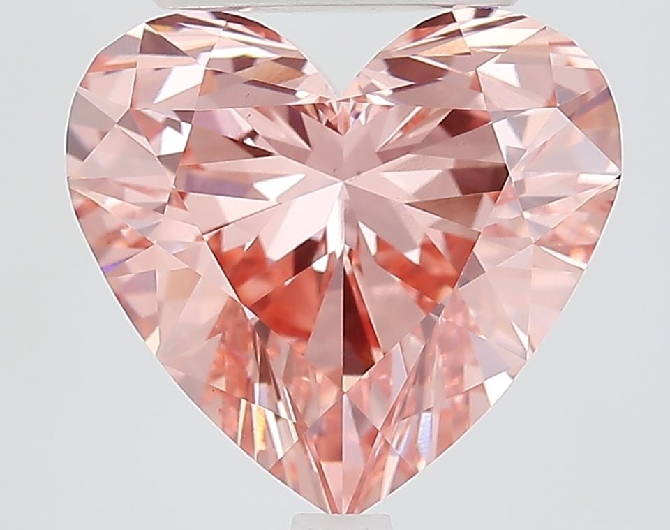 Loose Diamond - HEART 5.07ct Fancy Vivid Pink VS1: Loose Diamond - HEART 5.07ct Fancy Vivid Pink VS1 Source: This is a real non-mined Diamond that has been grown in a lab Shape: HEART Carats: 5.07 Color: Fancy Vivid Pink Certification: IGI Video: