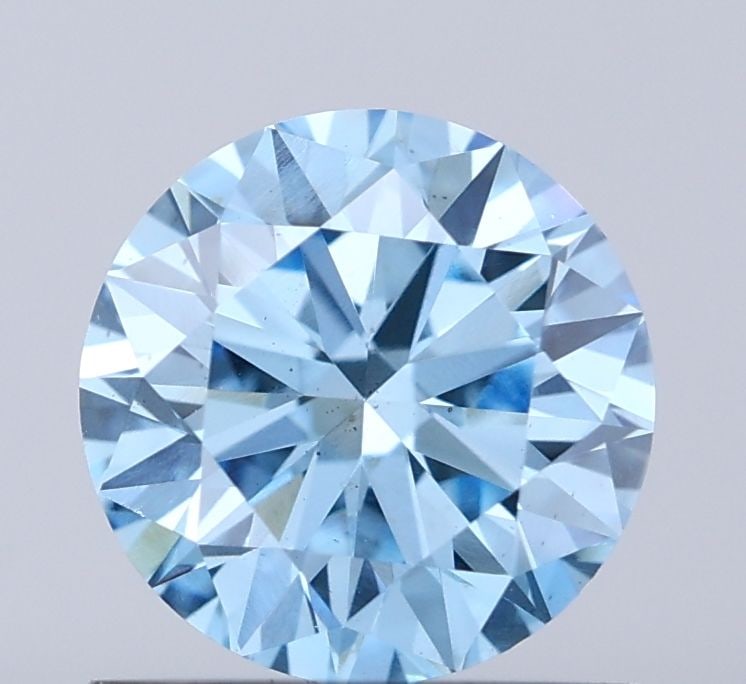 Loose Diamond - ROUND 0.9ct Fancy Vivid Blue VS1: Loose Diamond - ROUND 0.9ct Fancy Vivid Blue VS1 Source: This is a real non-mined Diamond that has been grown in a lab Shape: ROUND Carats: 0.9 Color: Fancy Vivid Blue Certification: IGI Video: