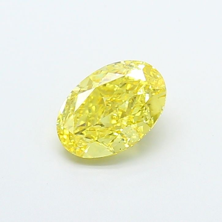 Loose Diamond - OVAL 1.52ct Fancy Vivid Yellow VS2: Loose Diamond - OVAL 1.52ct Fancy Vivid Yellow VS2 Source: This is a real non-mined Diamond that has been grown in a lab Shape: OVAL Carats: 1.52 Color: Fancy Vivid Yellow Certification: IGI Video: