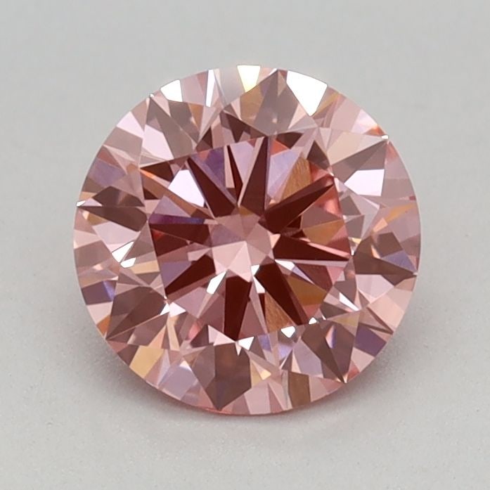 Ideal Loose Diamond - ROUND 0.74ct Fancy Vivid Pink VVS2: Ideal Loose Diamond - ROUND 0.74ct Fancy Vivid Pink VVS2 Source: This is a real non-mined Diamond that has been grown in a lab Shape: ROUND Carats: 0.74 Color: Fancy Vivid Pink Certification: IGI Vide