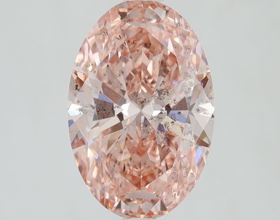 Loose Diamond - OVAL 2.0ct Fancy Vivid Pink SI1: Loose Diamond - OVAL 2.0ct Fancy Vivid Pink SI1 Source: This is a real non-mined Diamond that has been grown in a lab Shape: OVAL Carats: 2.0 Color: Fancy Vivid Pink Certification: IGI Video: