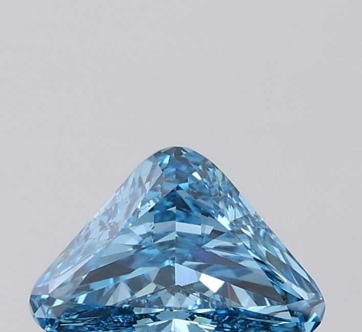 Loose Diamond - TRIANGULAR 1.07ct Fancy Vivid Blue VS1: Loose Diamond - TRIANGULAR 1.07ct Fancy Vivid Blue VS1 Source: This is a real non-mined Diamond that has been grown in a lab Shape: TRIANGULAR Carats: 1.07 Color: Fancy Vivid Blue Certification: IGI V