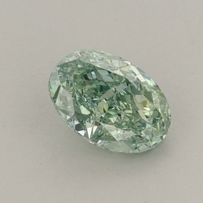 Loose Diamond - OVAL 0.57ct Fancy Vivid Green VS2: Loose Diamond - OVAL 0.57ct Fancy Vivid Green VS2 Source: This is a real non-mined Diamond that has been grown in a lab Shape: OVAL Carats: 0.57 Color: Fancy Vivid Green Certification: IGI The Diamond