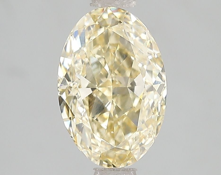 Loose Diamond - OVAL 2.07ct Fancy Intense Yellow VVS2: Loose Diamond - OVAL 2.07ct Fancy Intense Yellow VVS2 Source: This is a real non-mined Diamond that has been grown in a lab Shape: OVAL Carats: 2.07 Color: Fancy Intense Yellow Certification: IGI Vide