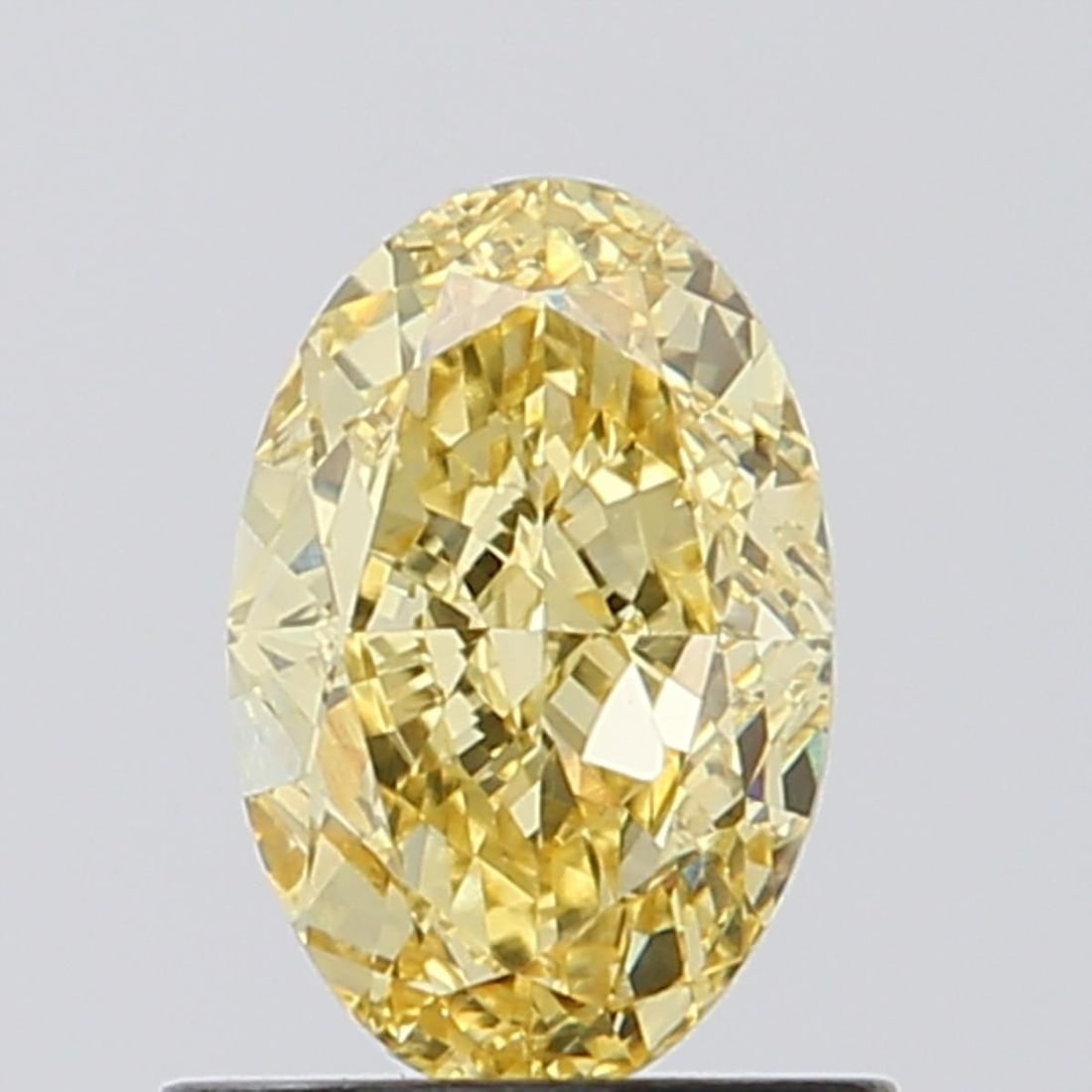 Loose Diamond - OVAL 0.99ct Fancy Vivid Yellow VS2: Loose Diamond - OVAL 0.99ct Fancy Vivid Yellow VS2 Source: This is a real non-mined Diamond that has been grown in a lab Shape: OVAL Carats: 0.99 Color: Fancy Vivid Yellow Certification: NONE Video:
