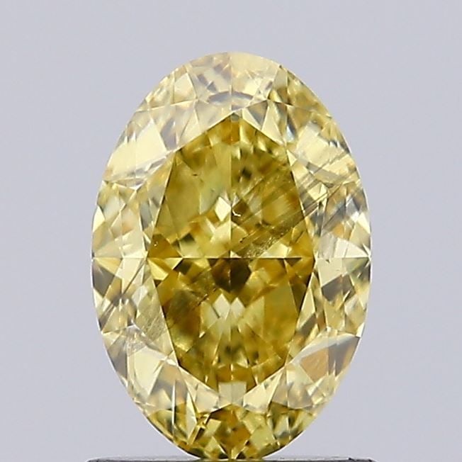 Loose Diamond - OVAL 1.13ct Fancy Intense Yellow SI1: Loose Diamond - OVAL 1.13ct Fancy Intense Yellow SI1 Source: This is a real non-mined Diamond that has been grown in a lab Shape: OVAL Carats: 1.13 Color: Fancy Intense Yellow Certification: IGI Video