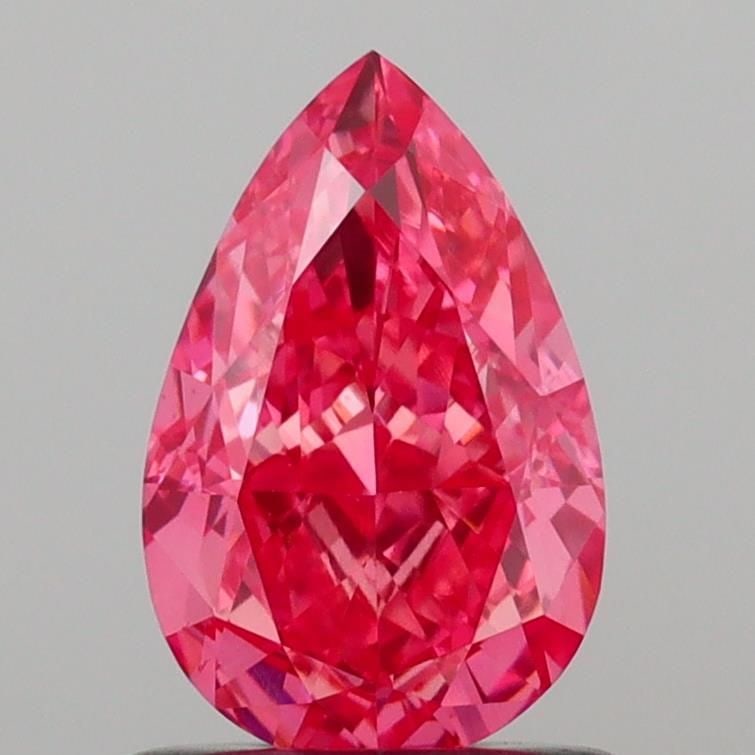 Loose Diamond - PEAR 1.0ct Fancy Vivid Pink VS1: Loose Diamond - PEAR 1.0ct Fancy Vivid Pink VS1 Source: This is a real non-mined Diamond that has been grown in a lab Shape: PEAR Carats: 1.0 Color: Fancy Vivid Pink Certification: IGI Video: