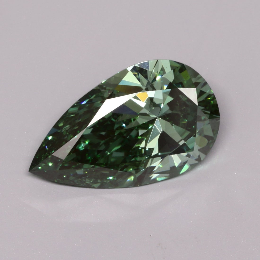 Loose Diamond - PEAR 3.02ct Fancy Vivid Green VS2: Loose Diamond - PEAR 3.02ct Fancy Vivid Green VS2 Source: This is a real non-mined Diamond that has been grown in a lab Shape: PEAR Carats: 3.02 Color: Fancy Vivid Green Certification: IGI Video: