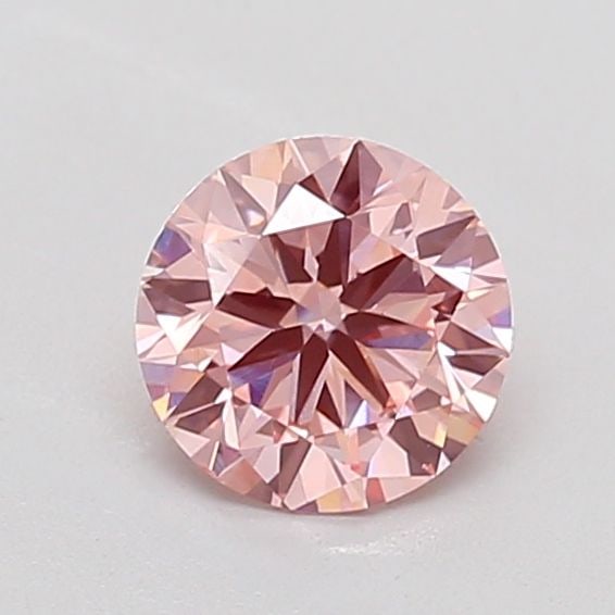 Loose Diamond - ROUND 0.7ct Fancy Vivid Pink VVS2: Loose Diamond - ROUND 0.7ct Fancy Vivid Pink VVS2 Source: This is a real non-mined Diamond that has been grown in a lab Shape: ROUND Carats: 0.7 Color: Fancy Vivid Pink Certification: NONE The Diamond