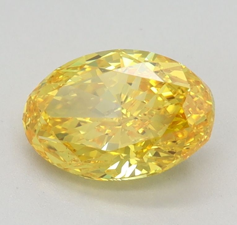 Loose Diamond - OVAL 1.01ct Fancy Vivid Yellow VS2: Loose Diamond - OVAL 1.01ct Fancy Vivid Yellow VS2 Source: This is a real non-mined Diamond that has been grown in a lab Shape: OVAL Carats: 1.01 Color: Fancy Vivid Yellow Certification: IGI Video: