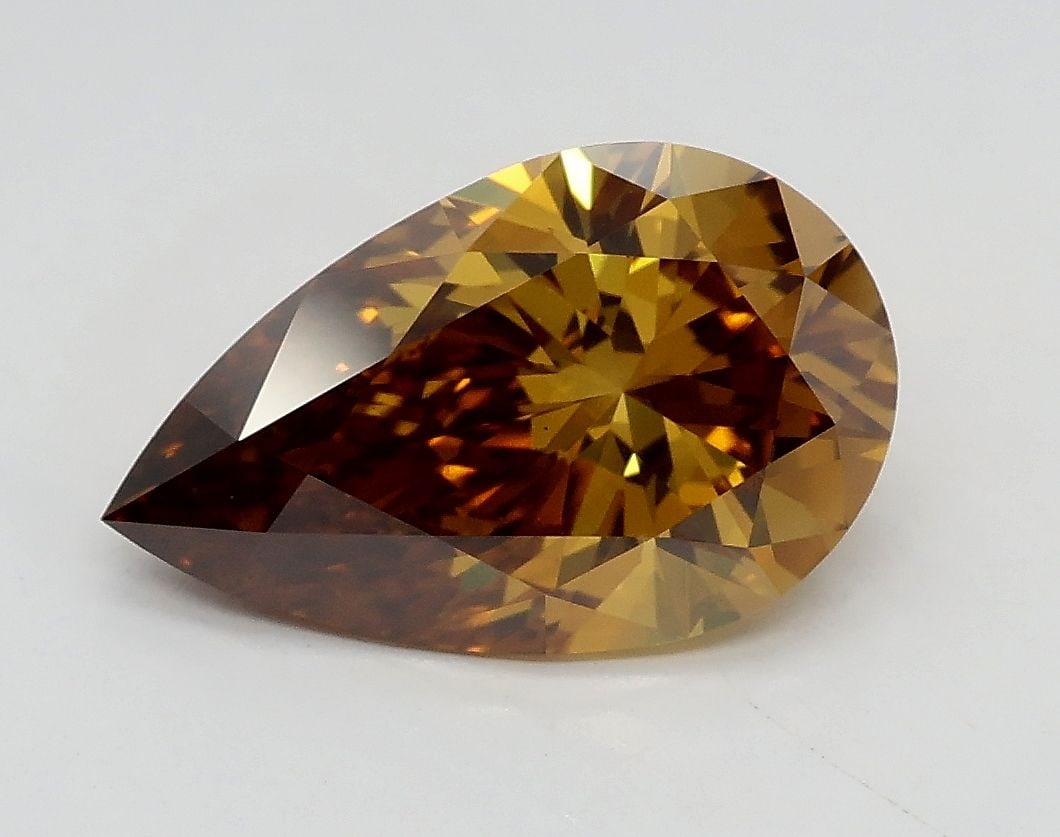 Loose Diamond - PEAR 1.8ct Fancy Brownish Yellow VS1: Loose Diamond - PEAR 1.8ct Fancy Brownish Yellow VS1 Source: This is a real non-mined Diamond that has been grown in a lab Shape: PEAR Carats: 1.8 Color: Fancy Brownish Yellow Certification: IGI Video