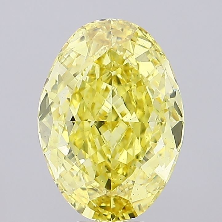 Loose Diamond - OVAL 9.64ct Fancy Vivid Yellow VS2: Loose Diamond - OVAL 9.64ct Fancy Vivid Yellow VS2 Source: This is a real non-mined Diamond that has been grown in a lab Shape: OVAL Carats: 9.64 Color: Fancy Vivid Yellow Certification: IGI Video:
