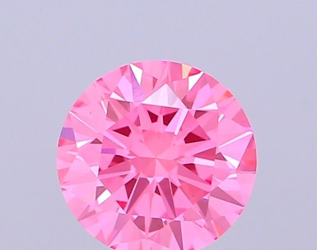 Loose Diamond - ROUND 1.0ct Fancy Vivid Pink VVS2: Loose Diamond - ROUND 1.0ct Fancy Vivid Pink VVS2 Source: This is a real non-mined Diamond that has been grown in a lab Shape: ROUND Carats: 1.0 Color: Fancy Vivid Pink Certification: IGI Video: