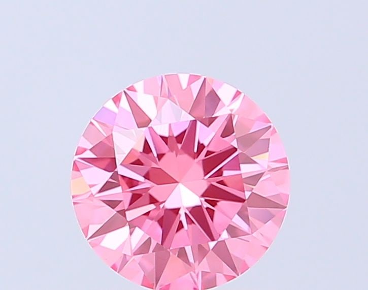 Loose Diamond - ROUND 1.01ct Fancy Vivid Pink VVS2: Loose Diamond - ROUND 1.01ct Fancy Vivid Pink VVS2 Source: This is a real non-mined Diamond that has been grown in a lab Shape: ROUND Carats: 1.01 Color: Fancy Vivid Pink Certification: IGI Video: