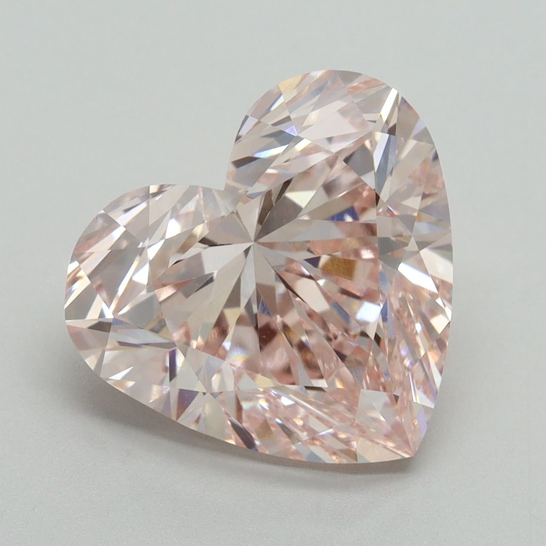 Loose Diamond - HEART 6.61ct Fancy Pink VVS2: Loose Diamond - HEART 6.61ct Fancy Pink VVS2 Source: This is a real non-mined Diamond that has been grown in a lab Shape: HEART Carats: 6.61 Color: Fancy Pink Certification: IGI Video: