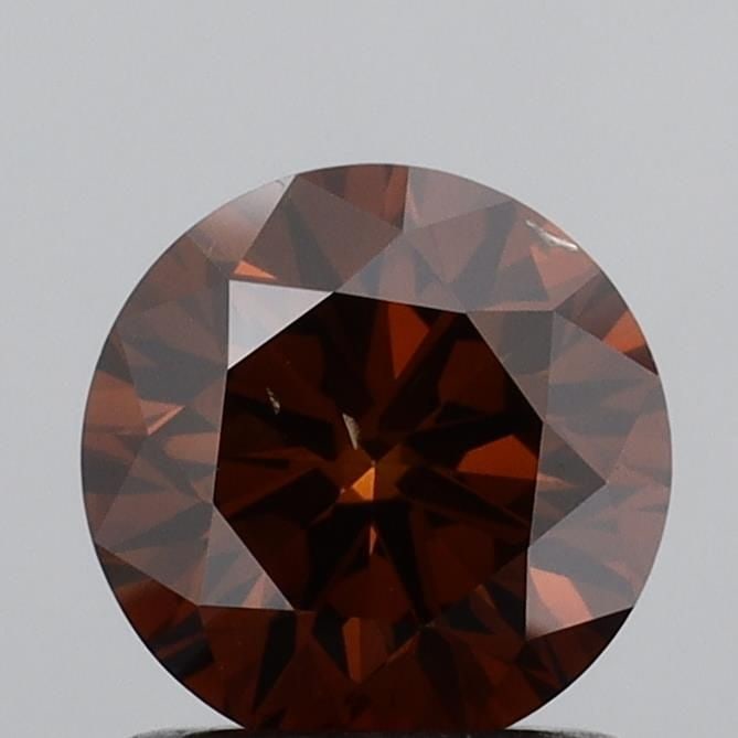 Loose Diamond - ROUND 1.1ct Fancy Deep Orangey Brown SI1: Loose Diamond - ROUND 1.1ct Fancy Deep Orangey Brown SI1 Source: This is a real non-mined Diamond that has been grown in a lab Shape: ROUND Carats: 1.1 Color: Fancy Deep Orangey Brown Certification: I