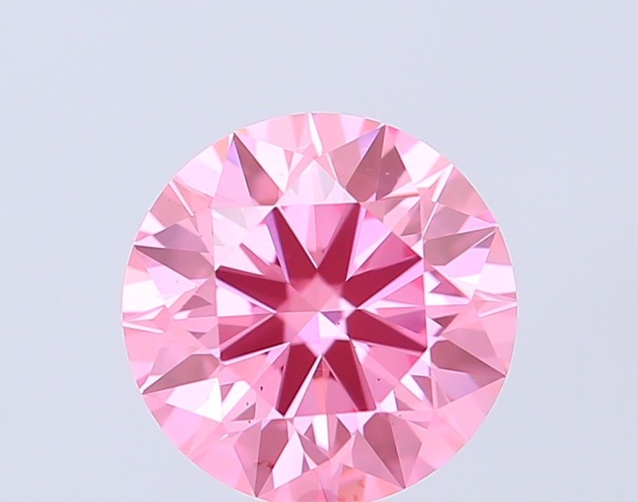 Ideal Loose Diamond - ROUND 1.08ct Fancy Vivid Pink VS2: Ideal Loose Diamond - ROUND 1.08ct Fancy Vivid Pink VS2 Source: This is a real non-mined Diamond that has been grown in a lab Shape: ROUND Carats: 1.08 Color: Fancy Vivid Pink Certification: IGI Video