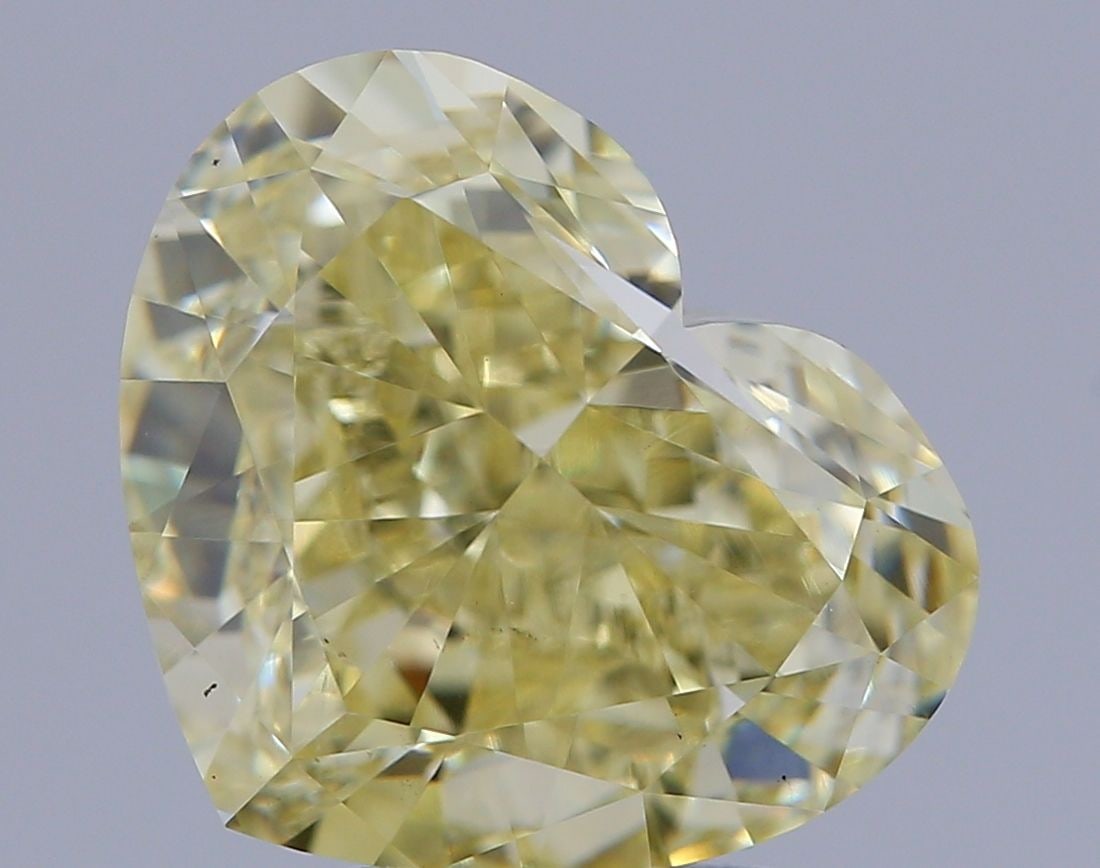 Loose Diamond - HEART 7.96ct Fancy Intense Yellow VS1: Loose Diamond - HEART 7.96ct Fancy Intense Yellow VS1 Source: This is a real non-mined Diamond that has been grown in a lab Shape: HEART Carats: 7.96 Color: Fancy Intense Yellow Certification: IGI Vid
