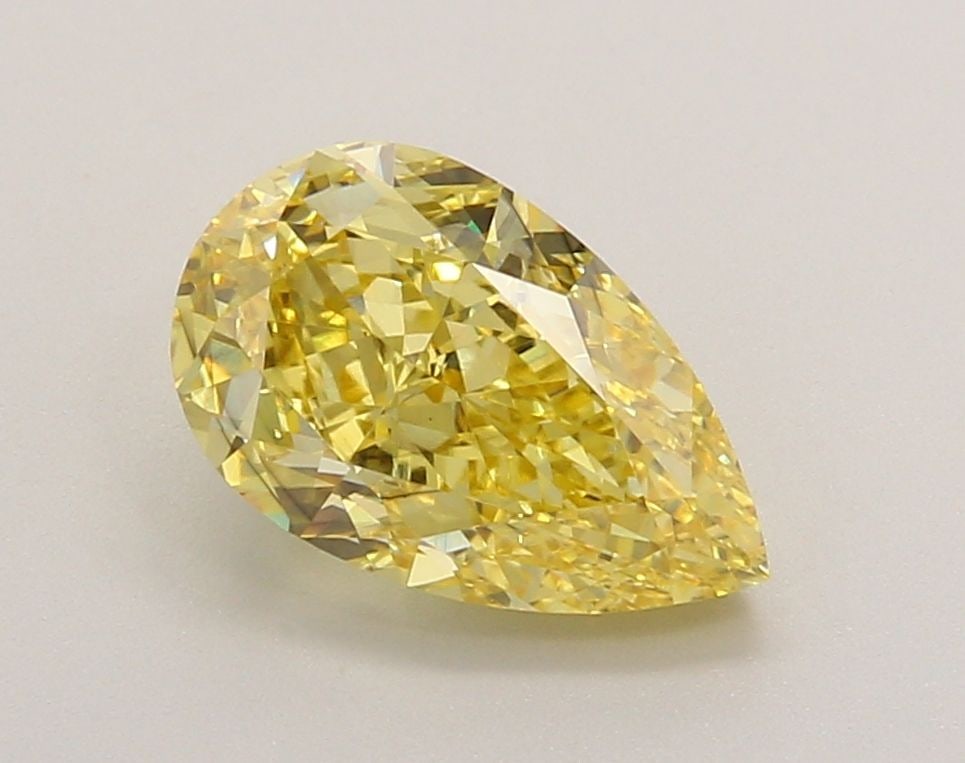 Loose Diamond - PEAR 2.23ct Fancy Vivid Yellow VS2: Loose Diamond - PEAR 2.23ct Fancy Vivid Yellow VS2 Source: This is a real non-mined Diamond that has been grown in a lab Shape: PEAR Carats: 2.23 Color: Fancy Vivid Yellow Certification: IGI Video: