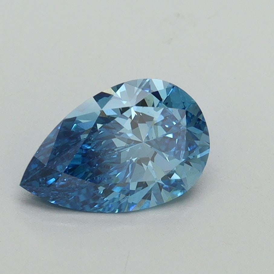 Loose Diamond - PEAR 1.0ct Fancy Vivid Blue VS1: Loose Diamond - PEAR 1.0ct Fancy Vivid Blue VS1 Source: This is a real non-mined Diamond that has been grown in a lab Shape: PEAR Carats: 1.0 Color: Fancy Vivid Blue Certification: IGI Video: